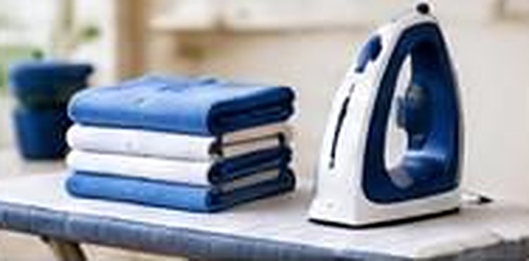 Iron with folded clothes