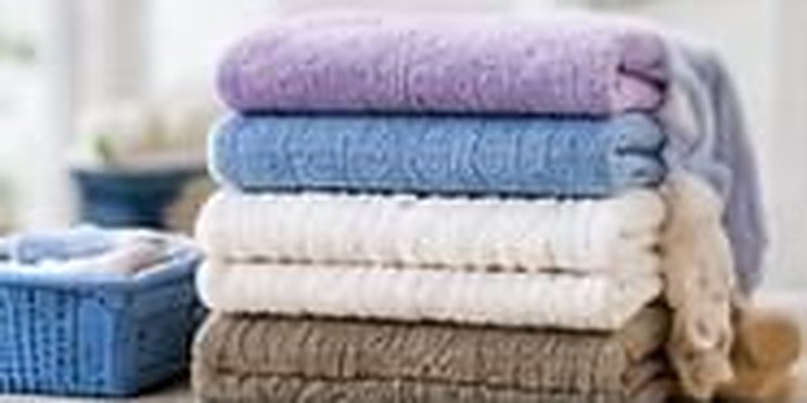 Stacked clean towels and sheets